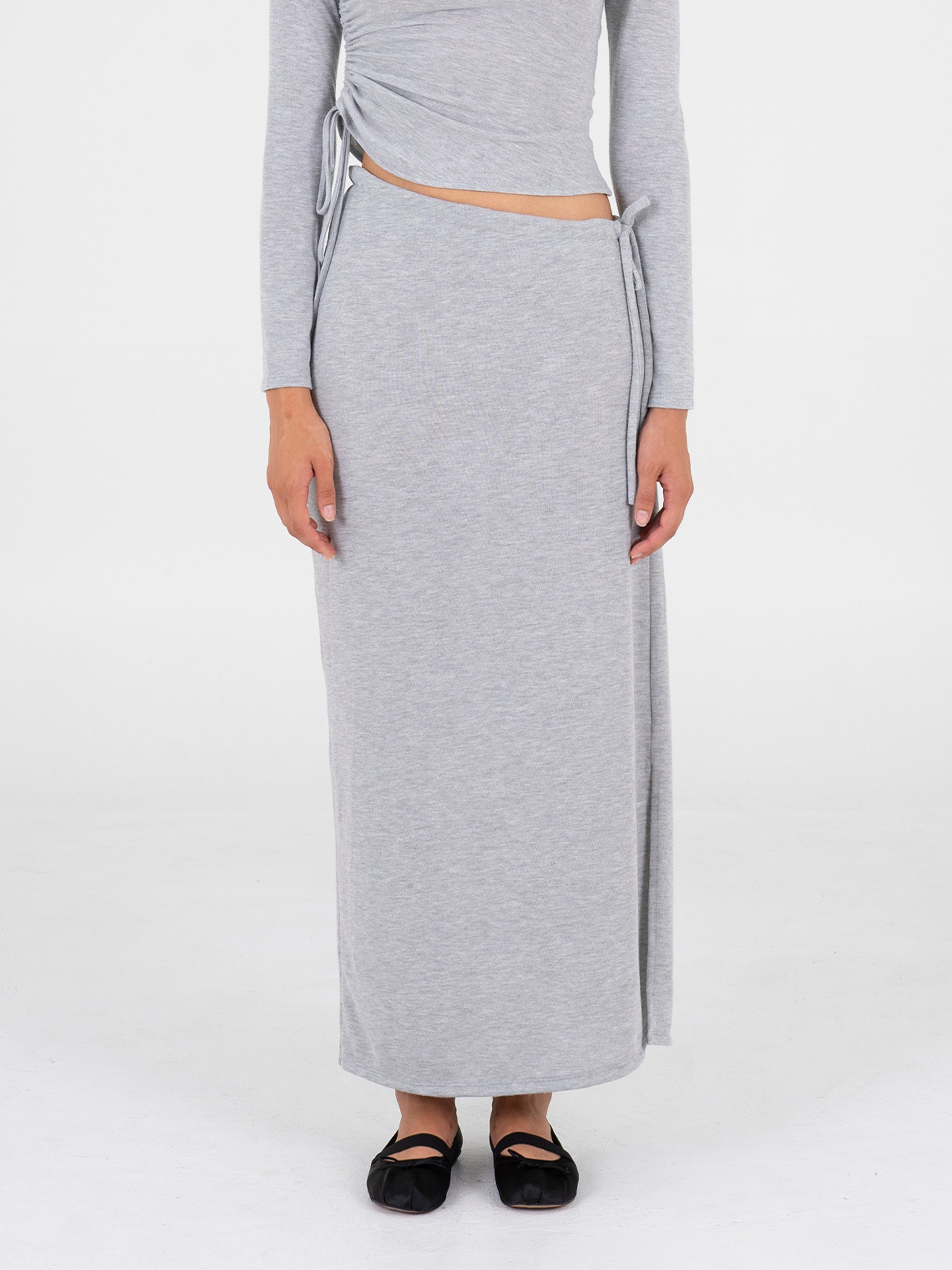 Long asymmetrical gray skirt with adjustable drawstring