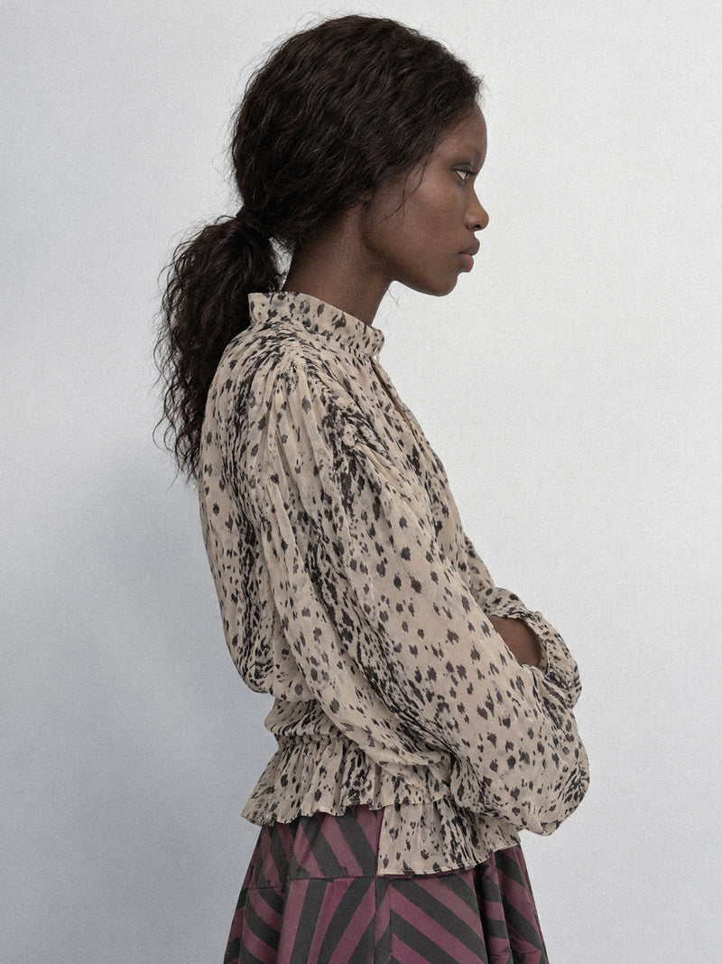 Frost Animal Print Ruffle Blouse