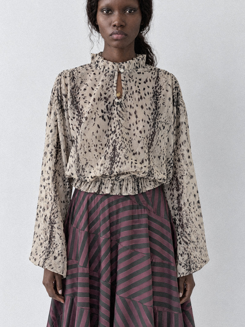 Frost Animal Print Ruffle Blouse