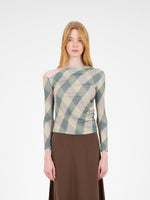 Completa tu look con Annapurna Green Rhombus Top 
