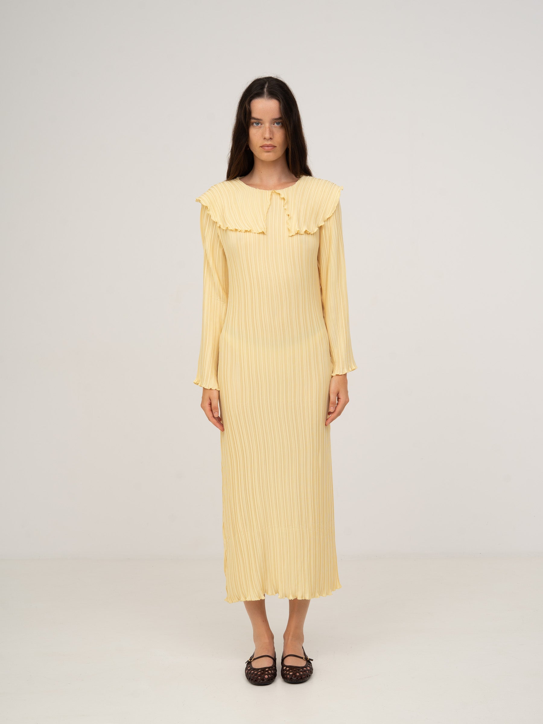 Yellow pleated maxi dress with babydoll neckline Yellow pleated maxi dress with babydoll neckline