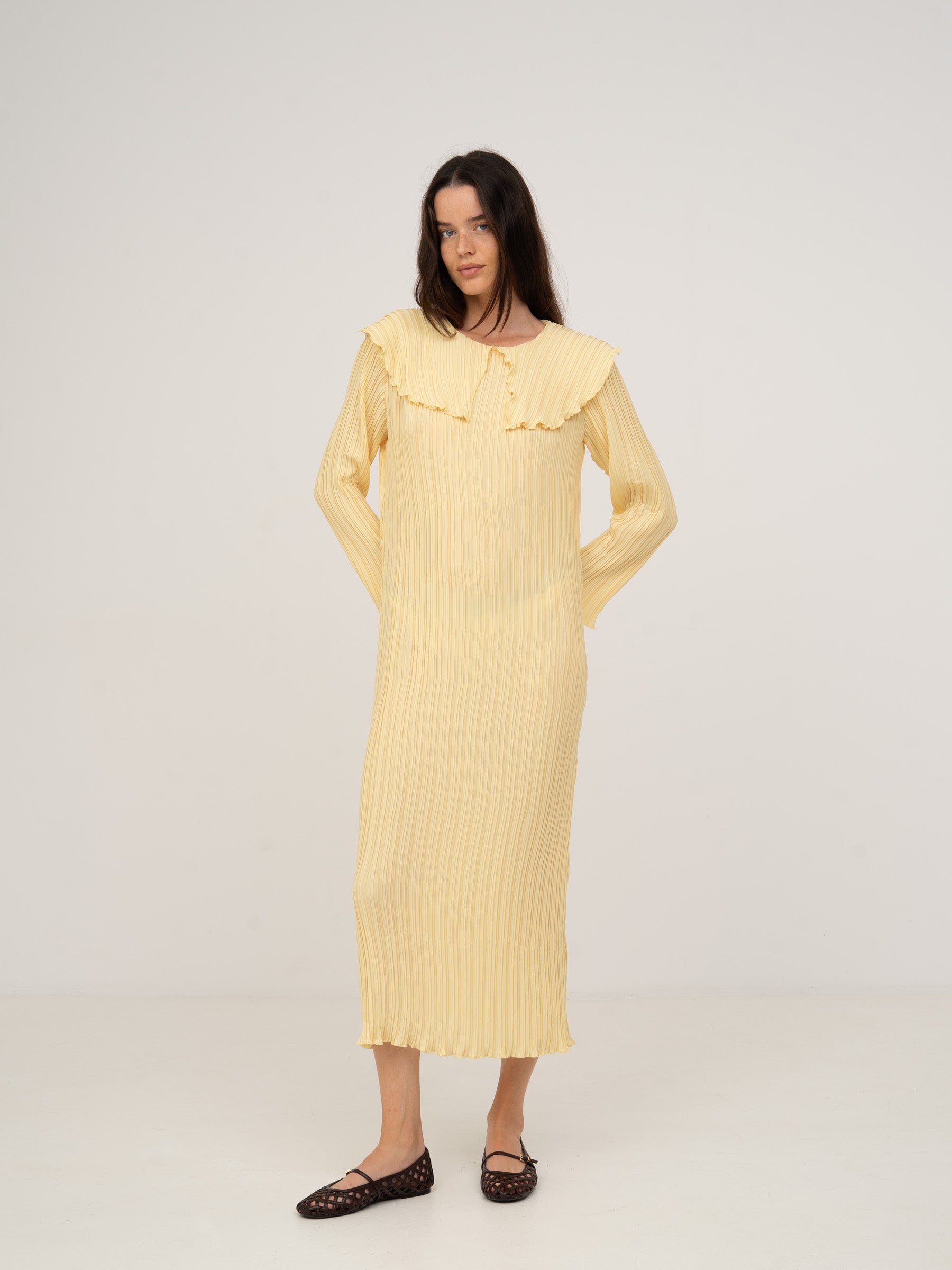 Yellow pleated maxi dress with babydoll neckline Yellow pleated maxi dress with babydoll neckline