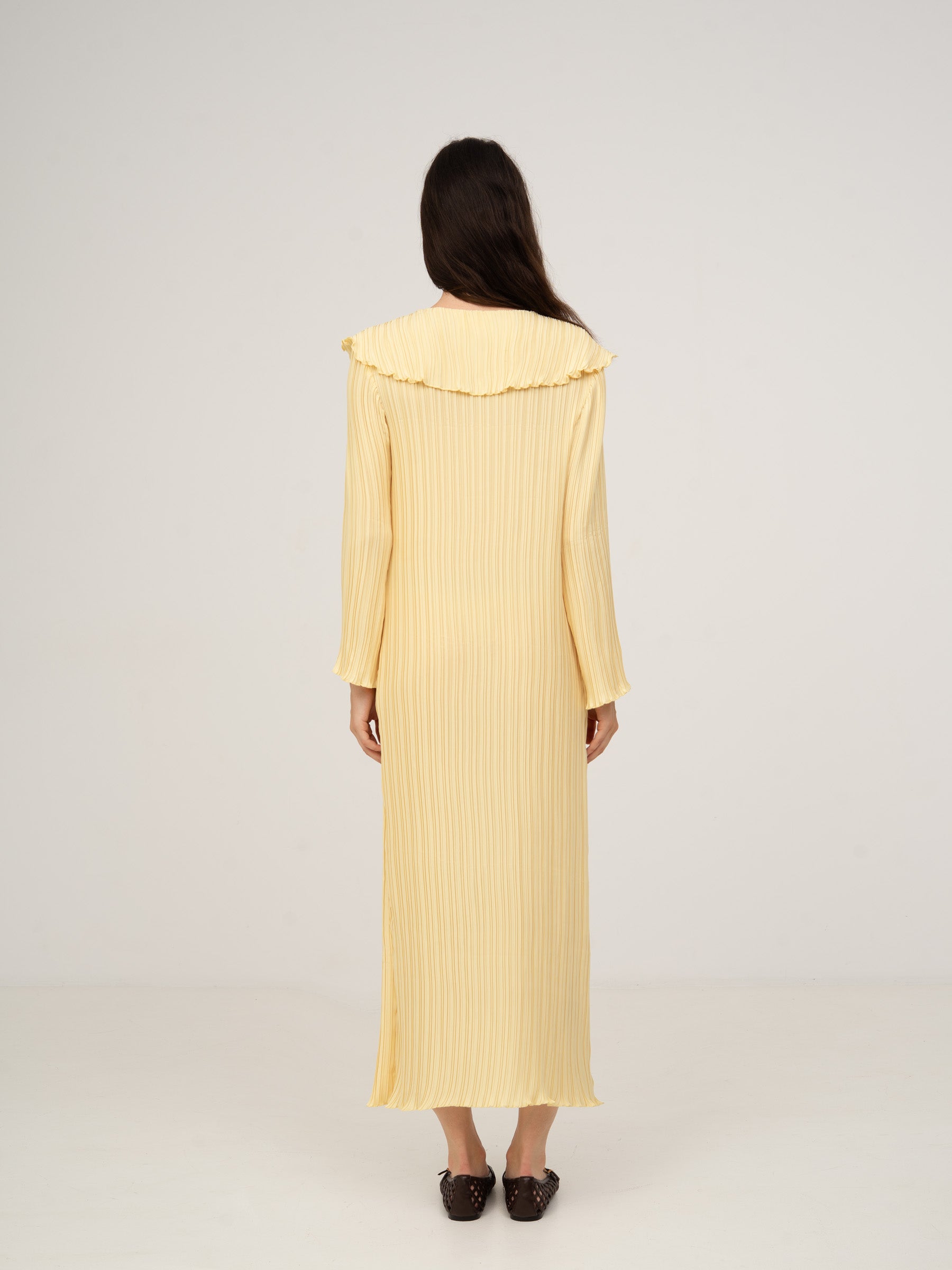 Yellow pleated maxi dress with babydoll neckline Yellow pleated maxi dress with babydoll neckline