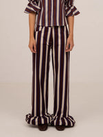 Completa tu look con Frostbite Striped Burgundy and Blue Trousers