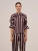Completa tu look con Frostbite Striped Burgundy and Blue Blouse