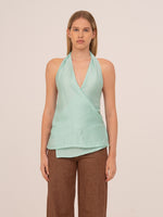 Completa tu look con Solea Mint Wrap Top