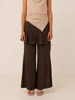 Completa tu look con Pisco Flared Pants With Wrapped Skirt Details