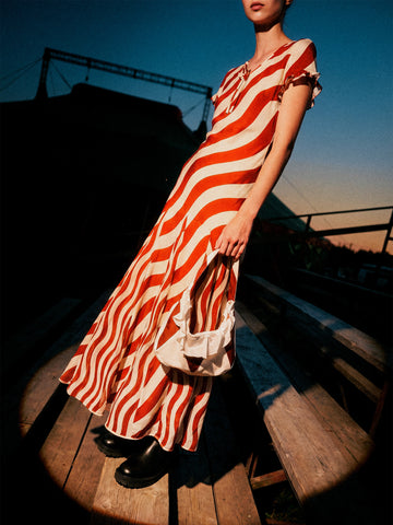 Red and cream maxi dress with wavy print and bow Red and cream maxi dress with wavy print and bow