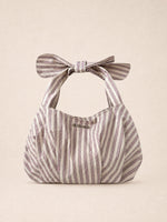 Completa tu look con Candy Striped Mini Bag