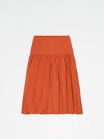 Completa tu look con Leo Terracotta Linen Midi Skirt