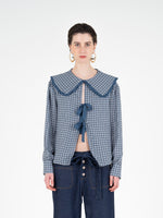 Completa tu look con Mystic Tartan Print Blouse
