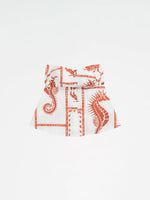 Completa tu look con Puck Ocean-Inspired Top