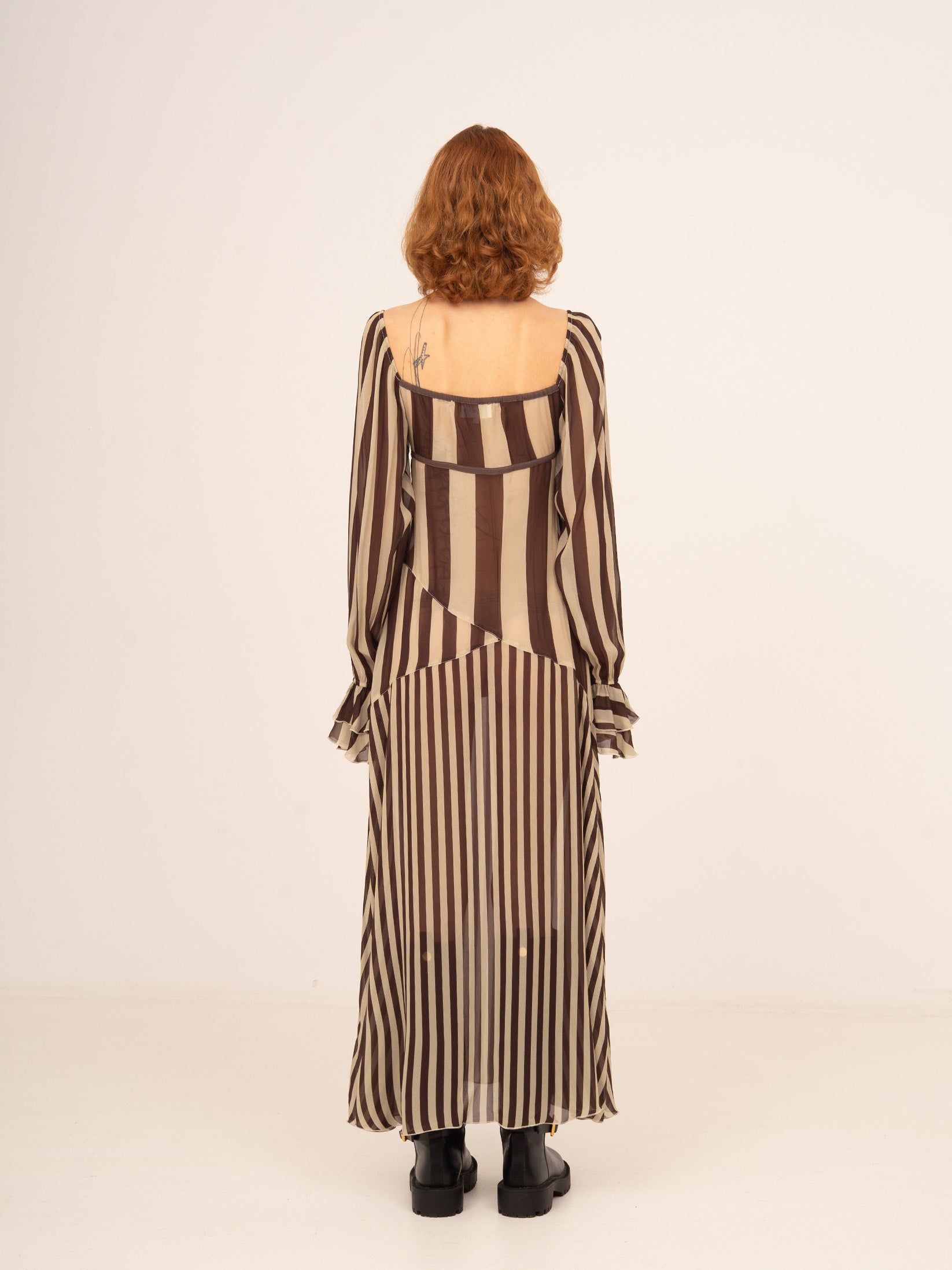 Long brown and cream striped dress with a square neckline